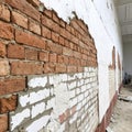 Brick Wall with Mixed Plaster Royalty Free Stock Photo