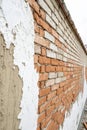Brick Wall with Mixed Plaster Royalty Free Stock Photo