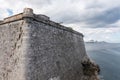 Brick wall of Morro Castle (Castillo de los Tres Reyes del Morro) and Malecon promenade in Havana, Cuba Royalty Free Stock Photo