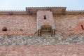 Brick wall of an old castle with toilet rooms Royalty Free Stock Photo