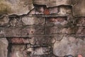 Brick wall of an old destroyed house. Vintage abstract pattern on cement texture. Grunge background. Concrete wall texture. Royalty Free Stock Photo