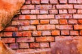 Brick wall with old plaster, background or texture. Royalty Free Stock Photo