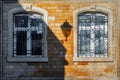 Brick wall of the old town house. lamp shade. Baku. Azerbaijan. Royalty Free Stock Photo