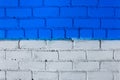 Brick wall paint two colors blue and light white abstract urban background design art texture Royalty Free Stock Photo