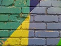 brick wall painted in different bright colors Royalty Free Stock Photo