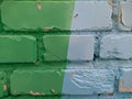 brick wall painted in different bright colors. Royalty Free Stock Photo