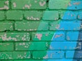 brick wall painted in different bright colors. Royalty Free Stock Photo