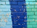 brick wall painted in different bright colors. Royalty Free Stock Photo