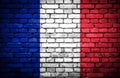 Brick wall with painted flag of France Royalty Free Stock Photo
