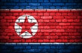 Brick wall with painted flag of North Korea Royalty Free Stock Photo