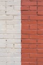 Brick wall painted white and red Royalty Free Stock Photo