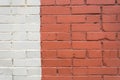 Brick wall painted white and red Royalty Free Stock Photo