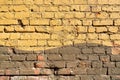 Brick wall painted yellow. Royalty Free Stock Photo