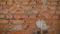 Weathered stained old orange and red brick wall, texture grunge background. Brick wall before processing Royalty Free Stock Photo