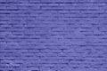 Brick wall of purple or violet masonry. Wall with small Bricks. Modern wallpaper design for web or graphic art projects