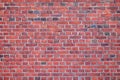 Brick wall of red stone, brick, brick background Royalty Free Stock Photo