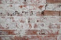 Brick wall with remaing plaster Royalty Free Stock Photo
