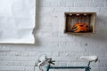Brick wall roadbike and poster in studio Royalty Free Stock Photo