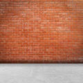 Brick wall room and floor background and texture with copy space Royalty Free Stock Photo