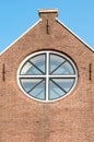 Brick wall with round window i Royalty Free Stock Photo