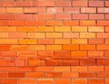 Gradient Orange Brick Wall with Subtle Color Variation and Textured Surface image photo Royalty Free Stock Photo