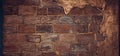 Brick wall texture background partially plastered with bronze paint