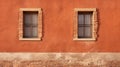 Spanish Enlightenment: Terracotta Windows On An Orange Wall