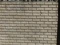 Brick wall using Stretcher bond for construction of compound wall without plaster only Royalty Free Stock Photo