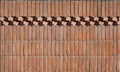 Brick wall with vertical bricks and two row of them arranged  obliquely and horizontal. Royalty Free Stock Photo