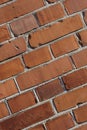 Brick wall, wallpaper and closeup of cement for texture, concrete pattern or masonry in architecture. Red stone Royalty Free Stock Photo