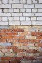 Brick wall of white and red bricks, texture and background, building houses Royalty Free Stock Photo