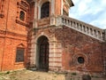 Brick wall with white stairs and door Royalty Free Stock Photo