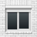 Brick wall with window and rolling shutters
