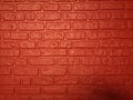 Brick walls show Pattern stack block rough surface texture material background Weld the joints with cement grout red color paint Royalty Free Stock Photo