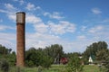 Brick water tower for irrigation in the garden village Royalty Free Stock Photo
