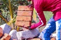 brick worker,Workers in a brick construction side,handsome hard worker people portrait at construction site