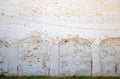 Bricked over archways with peeling paint in old wall Royalty Free Stock Photo