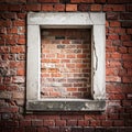 Bricked Up Window in Aged Red Brick Wall with Rough Stone Frame Texture Royalty Free Stock Photo