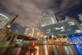 Brickell draw bridge Downtown Miami over river. Night long exposure photo blurry clouds in motion Royalty Free Stock Photo