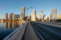 Brickell Key Bridge and City of Miami skyline at sunrise under clear blue sky. Royalty Free Stock Photo