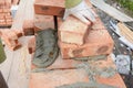 Bricklayer bricklaying house brick wall