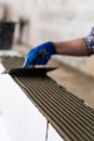 Bricklayer builder working with autoclaved aerated concrete blocks. Walling, installing bricks on construction site, Engineering Royalty Free Stock Photo