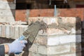 Bricklayer building wall Royalty Free Stock Photo