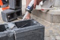 Masons work with concrete tiles - detail Royalty Free Stock Photo