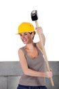 Bricklayer holding hammer Royalty Free Stock Photo