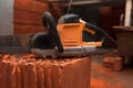 Saw for cutting brick lies on construction Royalty Free Stock Photo