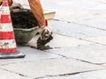 Bricklayer repairing floor Royalty Free Stock Photo