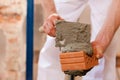 Bricklayer working on construction site