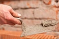 Bricklayer working on construction site