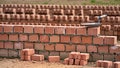 Bricklayers build a strong wall in the sunny outdoors Royalty Free Stock Photo